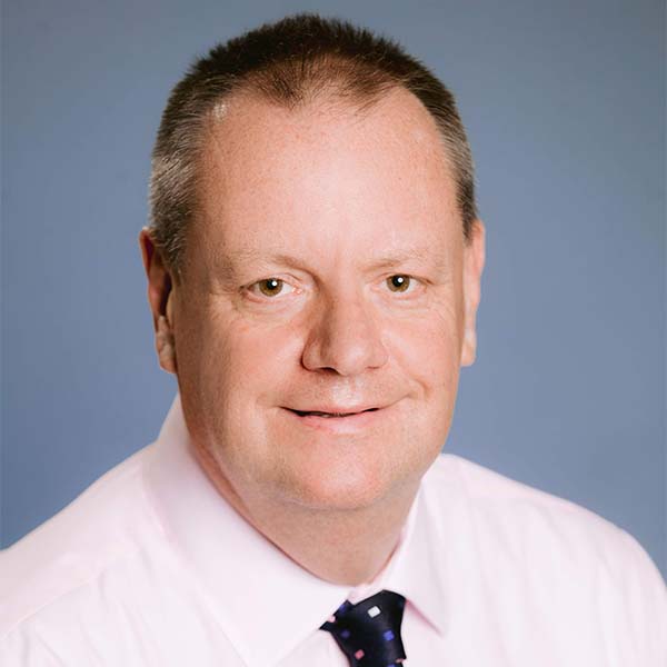 Headshot of Nick Madias, MBA, PMP