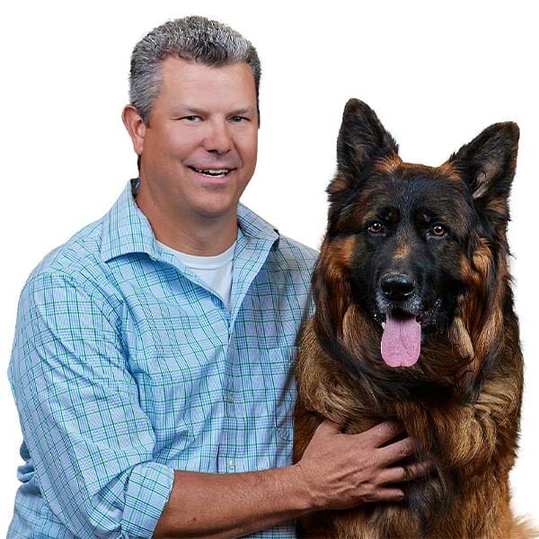 Dr. John C. Chandler with pet